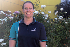 Rockingham General Hospital RGH Physiotherapist Lisa Holden stands in a garden.