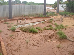 Swimming pool flooded by flood waters