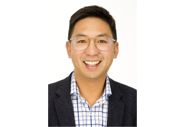 Professional photograph of Dr Wei-Sen Lam from the chest up, smiling at camera.